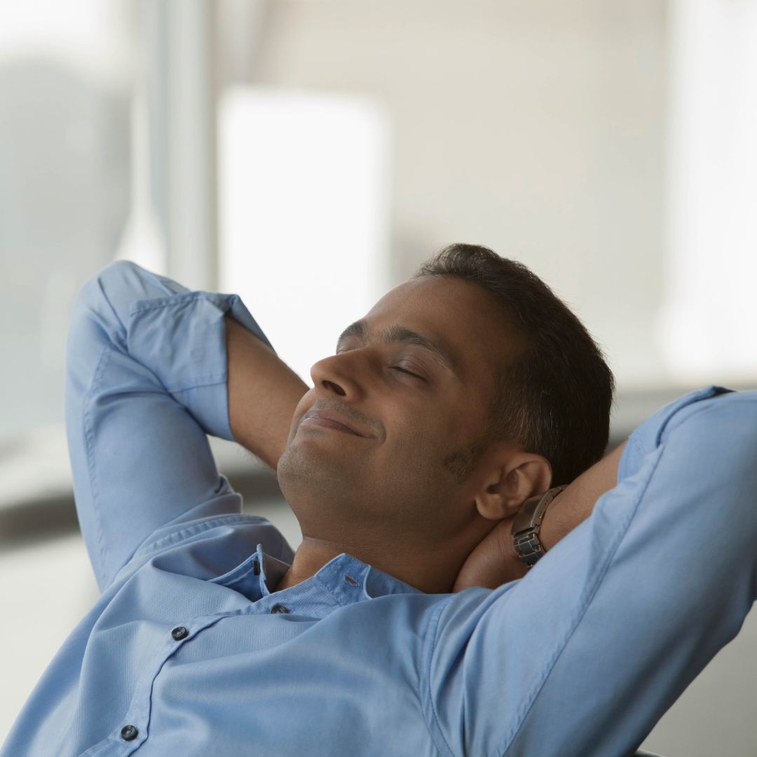 man relaxing in his home